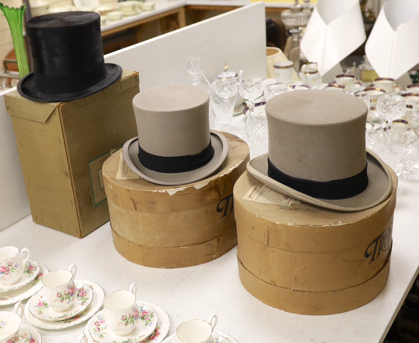 Three boxed top hats